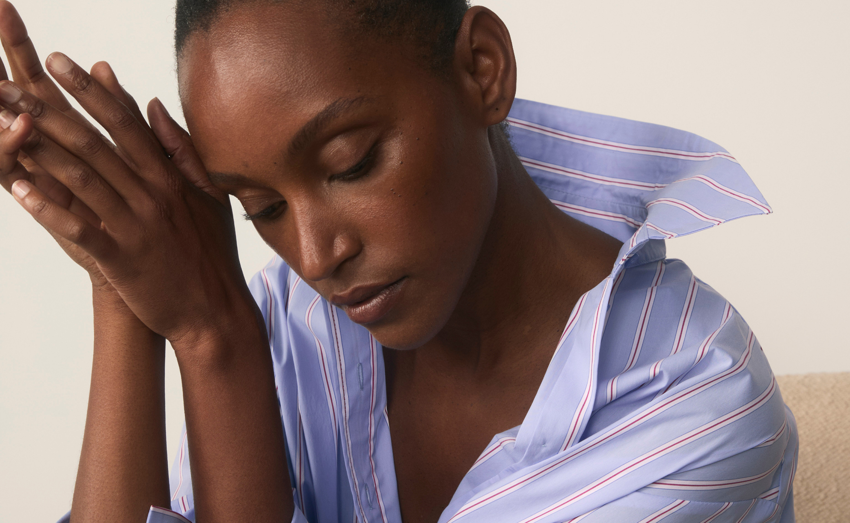 Model wearing blue stripe Claudia shirt