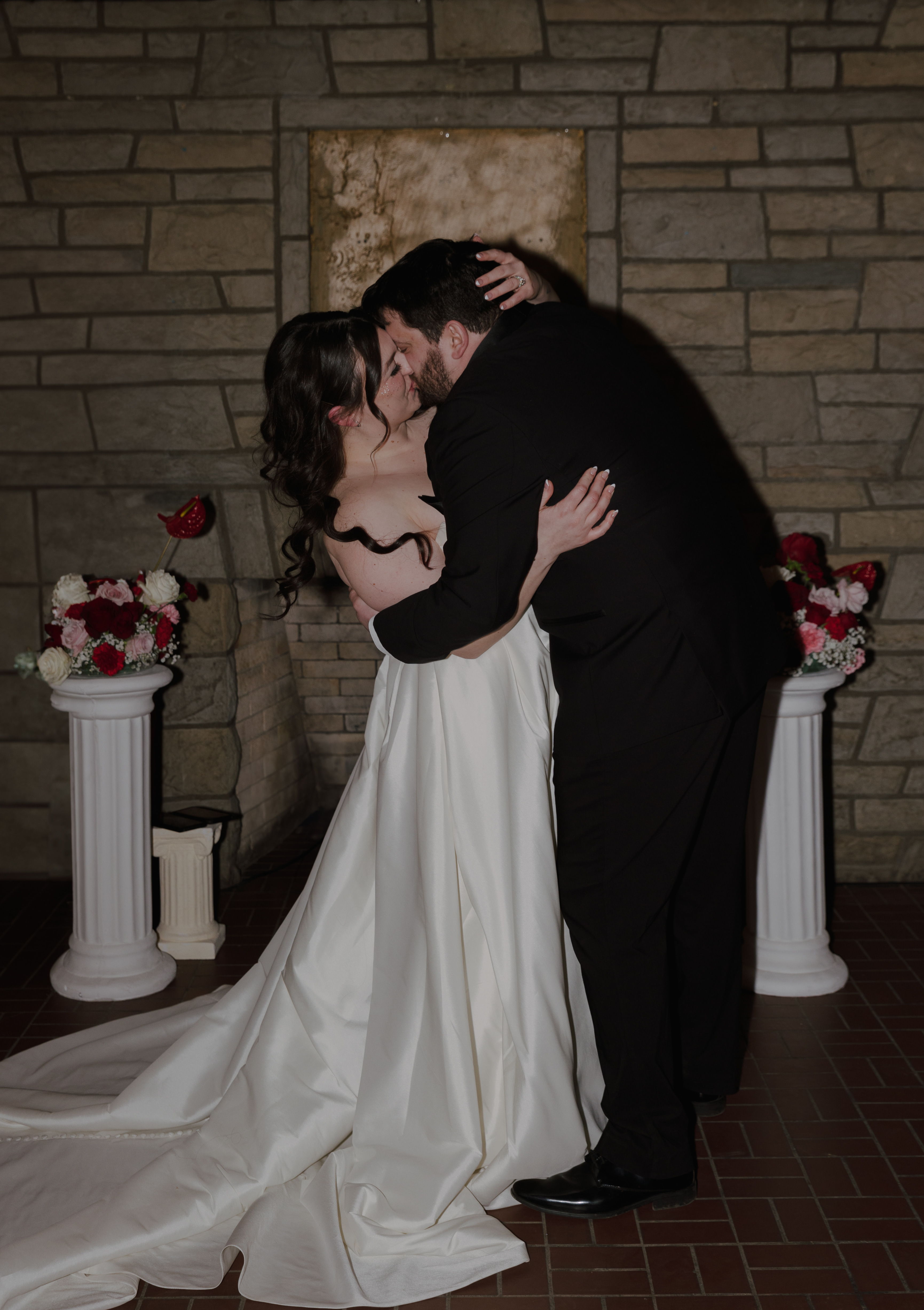 bride and groom kissing