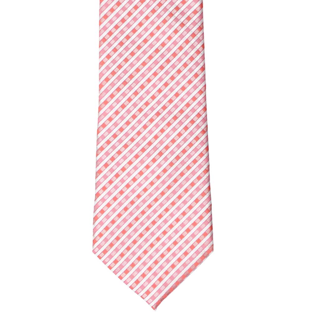 The front view of a pink, coral and white gingham plaid tie