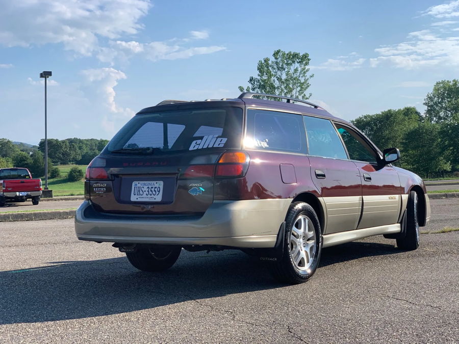 HornBlasters air compressor tank installed rear cargo Subaru Outback SUBARU rubber mat blue logo Adam's Conductor's Special 228H featured gallery photo 1