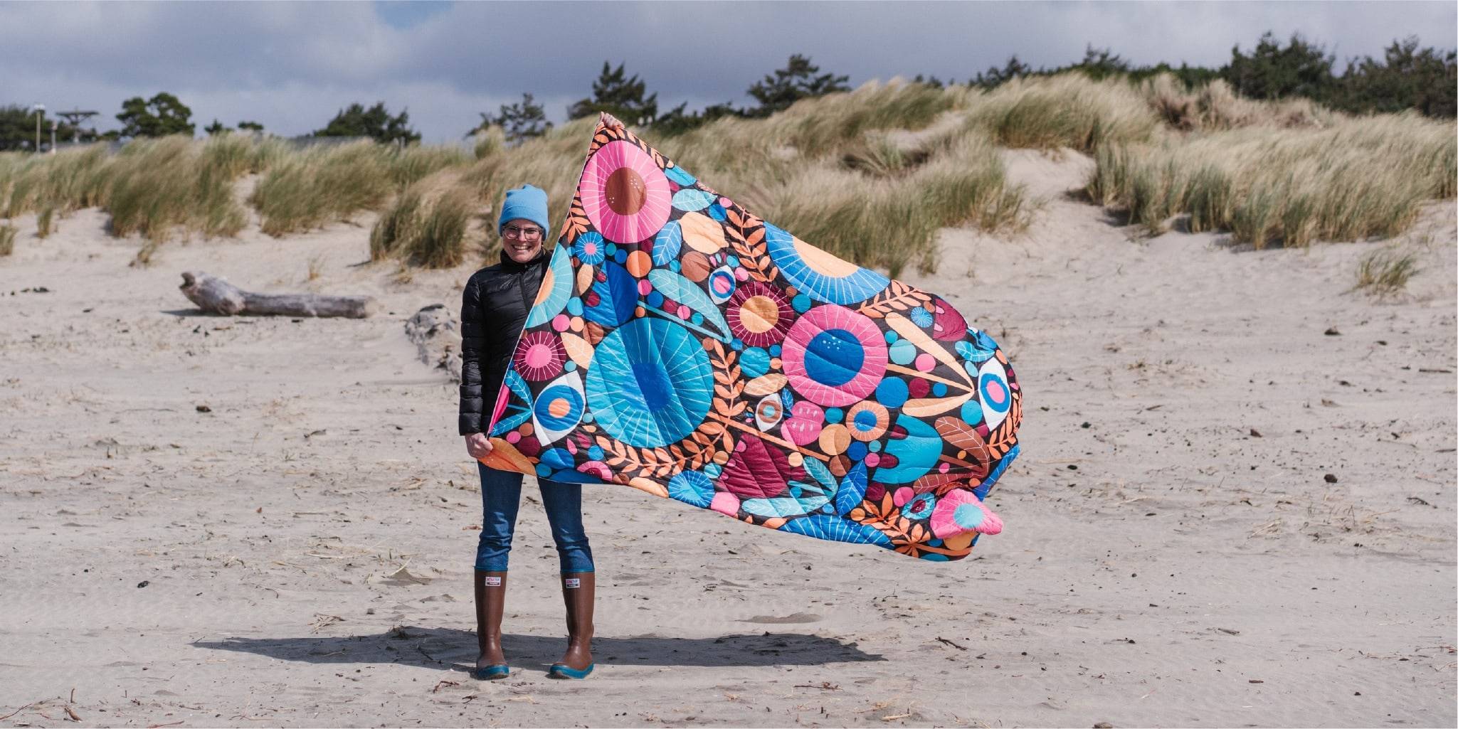 Lisa Congdon holding Night Garden Blanket