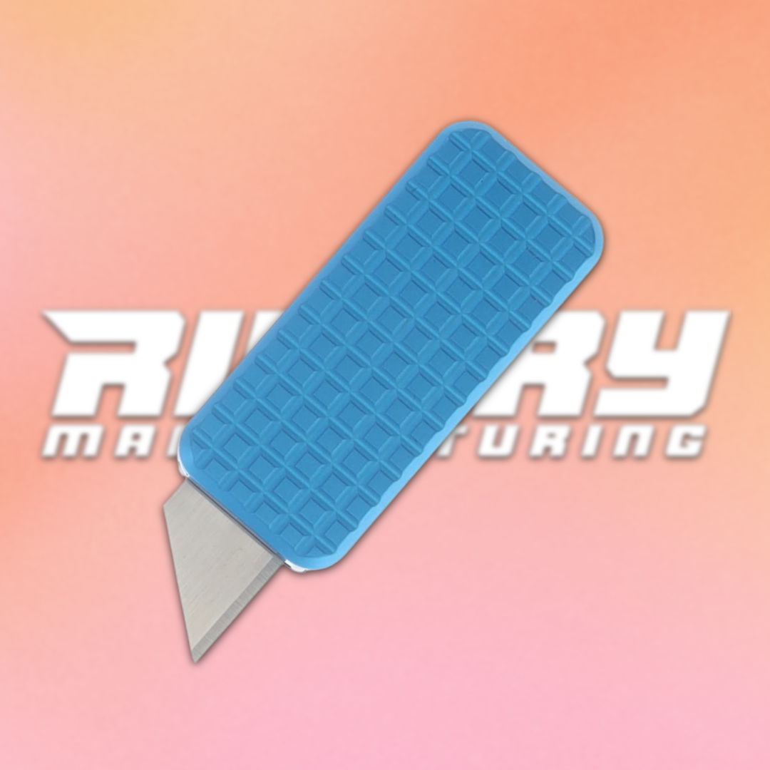 Blue utility knife on a gradient background with 