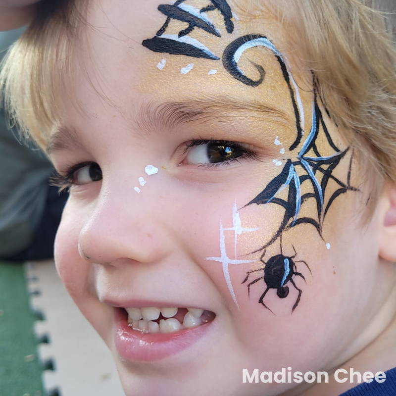 spider face paint with spider web