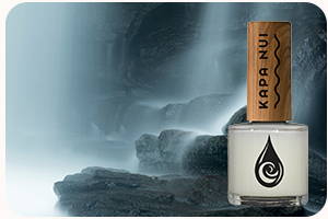 non toxic nail polish bottle in uhi color next to waterfall