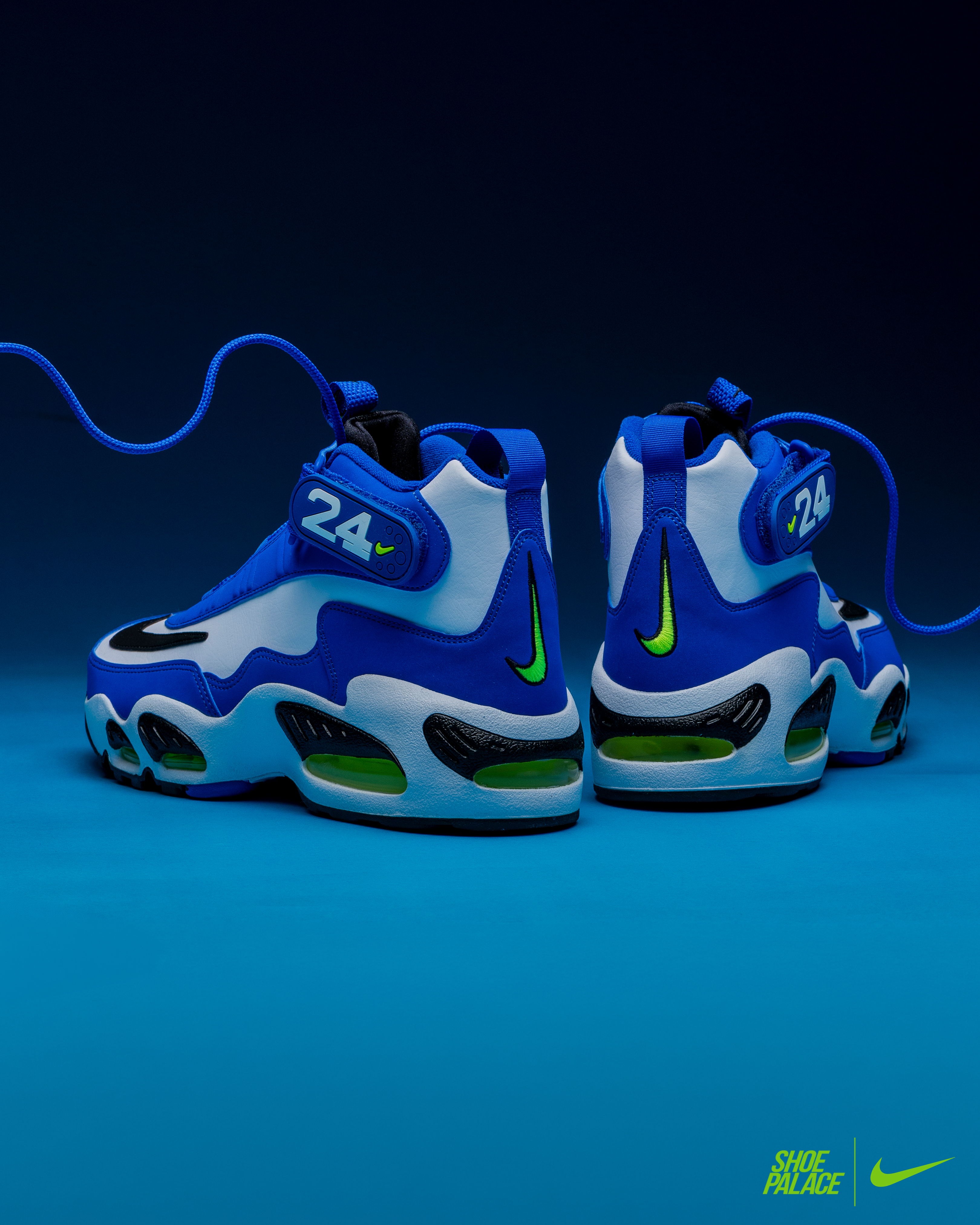 Air Griffey Max 1 Varsity Royal -Blue and white Nike sneakers with a neon green accent against a dark background.