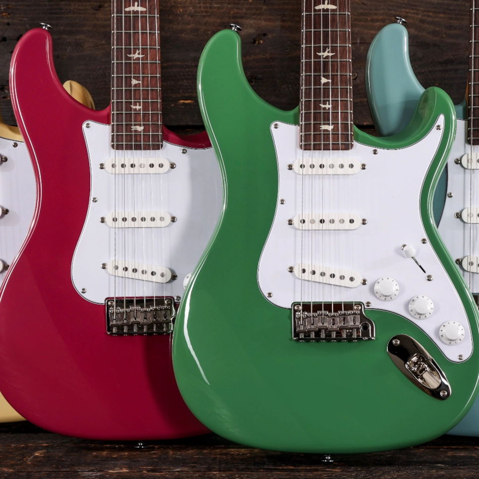 PRS SE Silver Sky electric guitars in various colours.