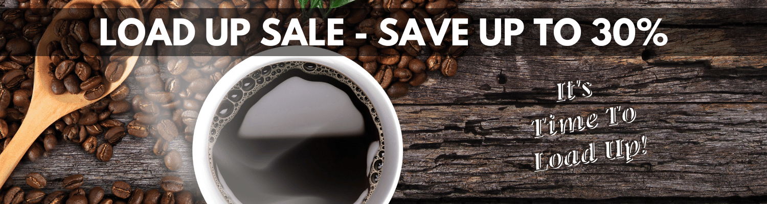 Promotional banner for a coffee sale with a cup of coffee, wooden spoon, and coffee beans on a rustic wood background.