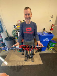 Man holding Dixie musical horn assembly