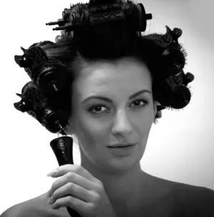 Girl with curlers in hair