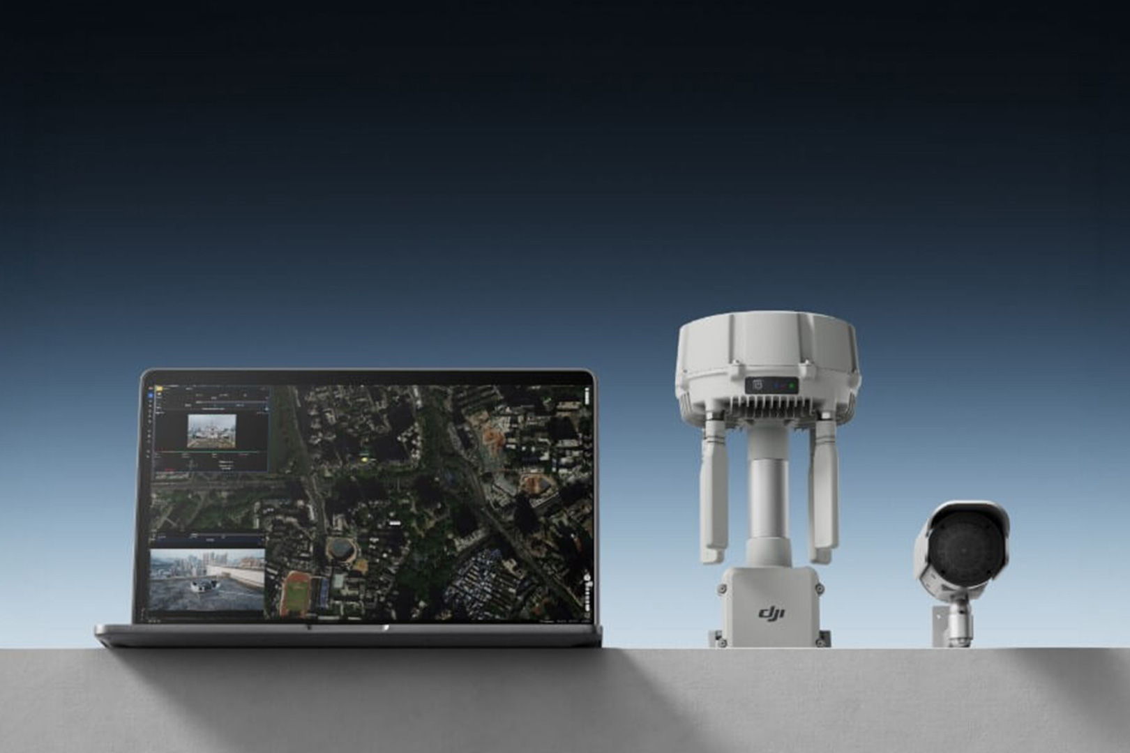 Laptop and drone equipment against a gradient background.