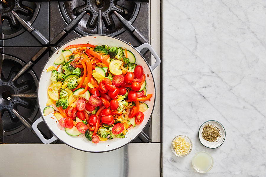 Tomatoes added to the pan.