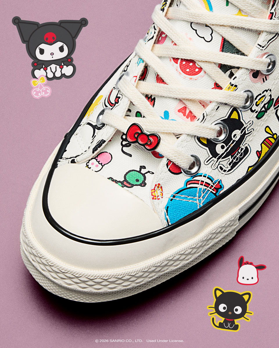 Colorful sneaker with cartoon characters and playful designs.