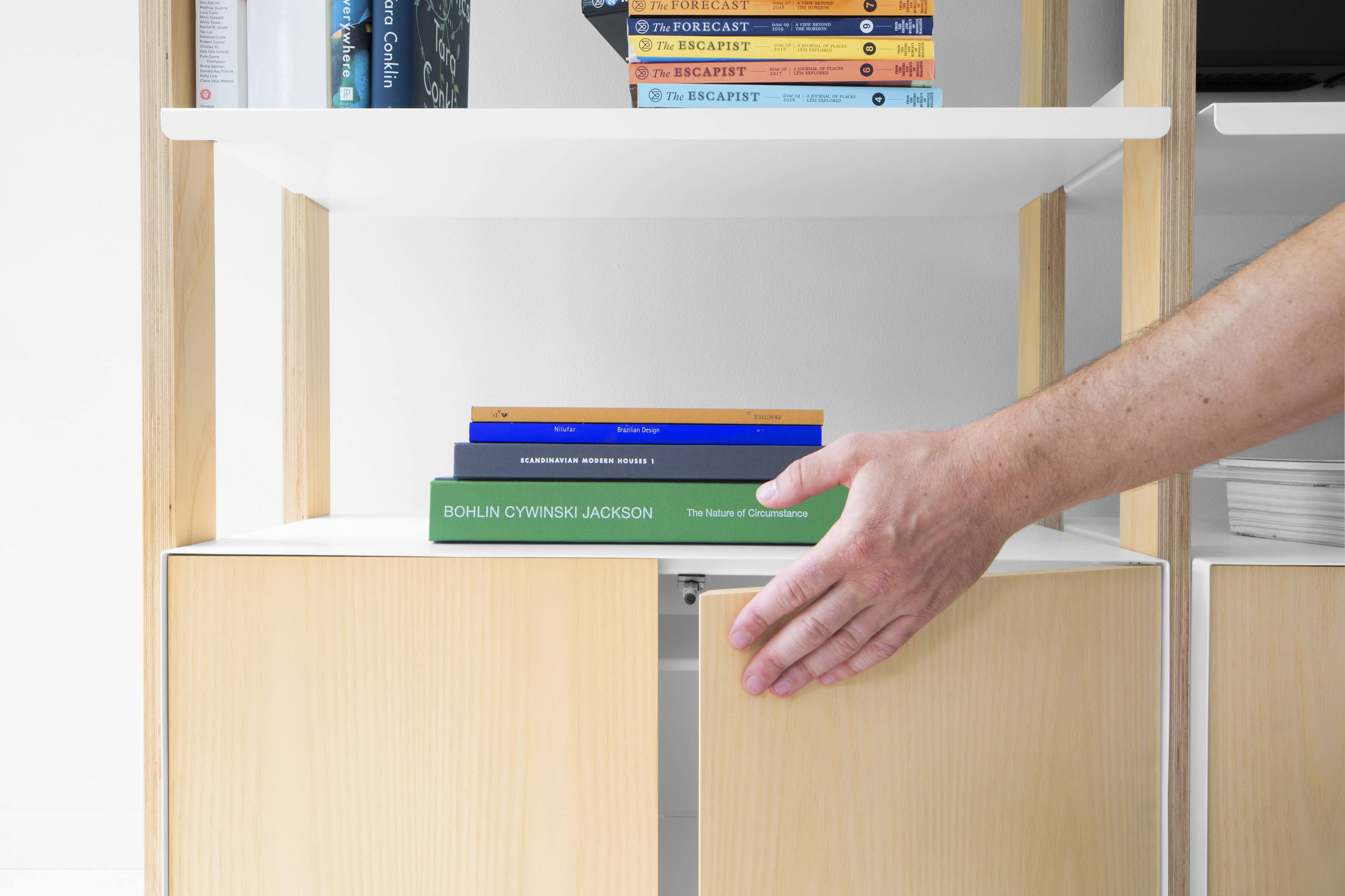 The Floyd shelf with cabinet in white and birch.
