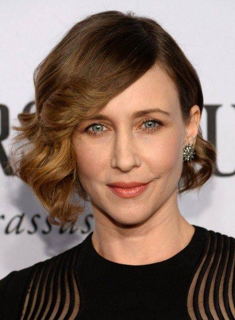 Vera Farmiga with brown asymmetrical short curly hair