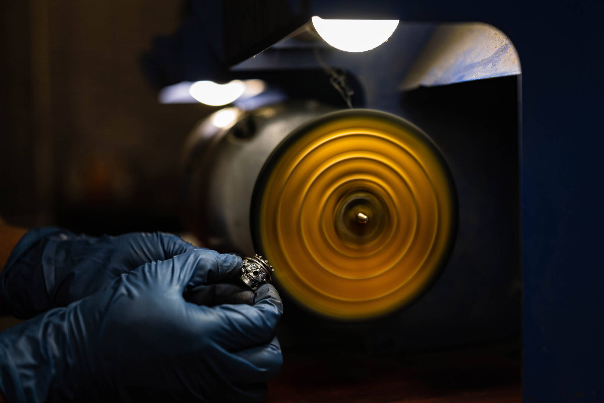A NightRider Master Jeweler polishing a Guardian ring