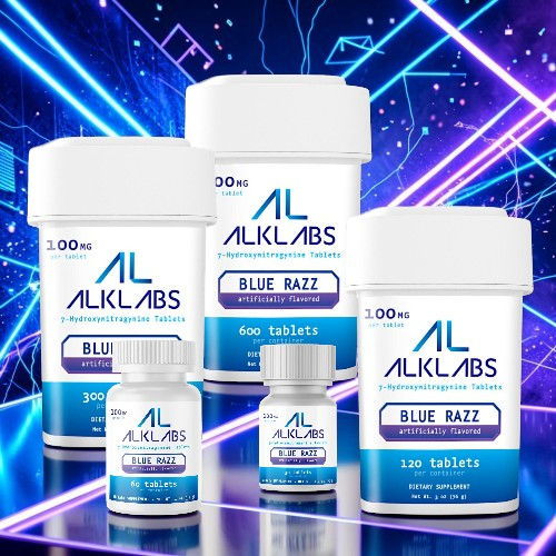 Bottles of ALKLABS supplements with a blue razz flavor on a colorful background.