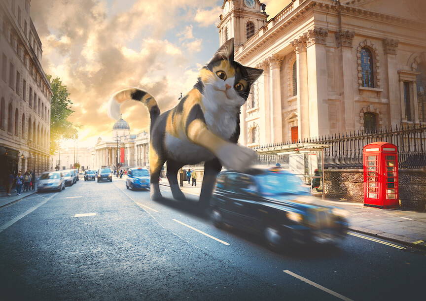 A giant calico cat stops a taxi with its paw near Trafalgar Square, the National Portrait Gallery in the background