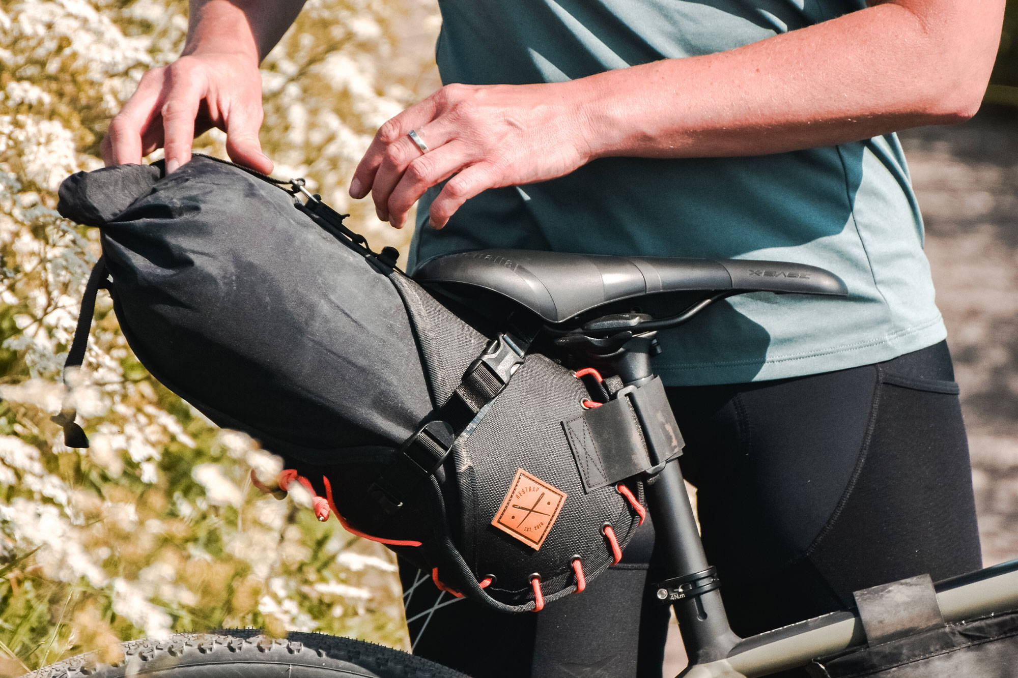 Rider packing a saddlebag