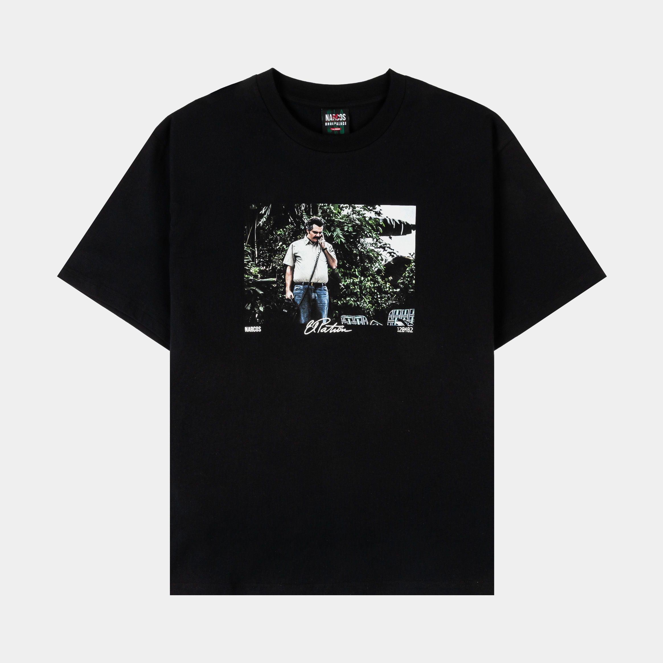 Black t-shirt with a graphic print of a person outdoors.
