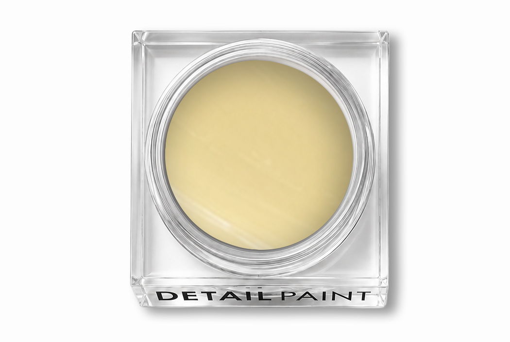 A square clear pot containing a pale yellow HEMA-Free art gel product.