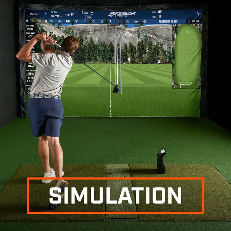 A golfer using the Launch Pro with an indoor golf simulator setup with FSX software