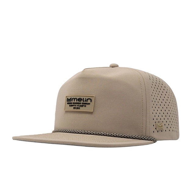 Beige cap with logo and perforated design on the sides.