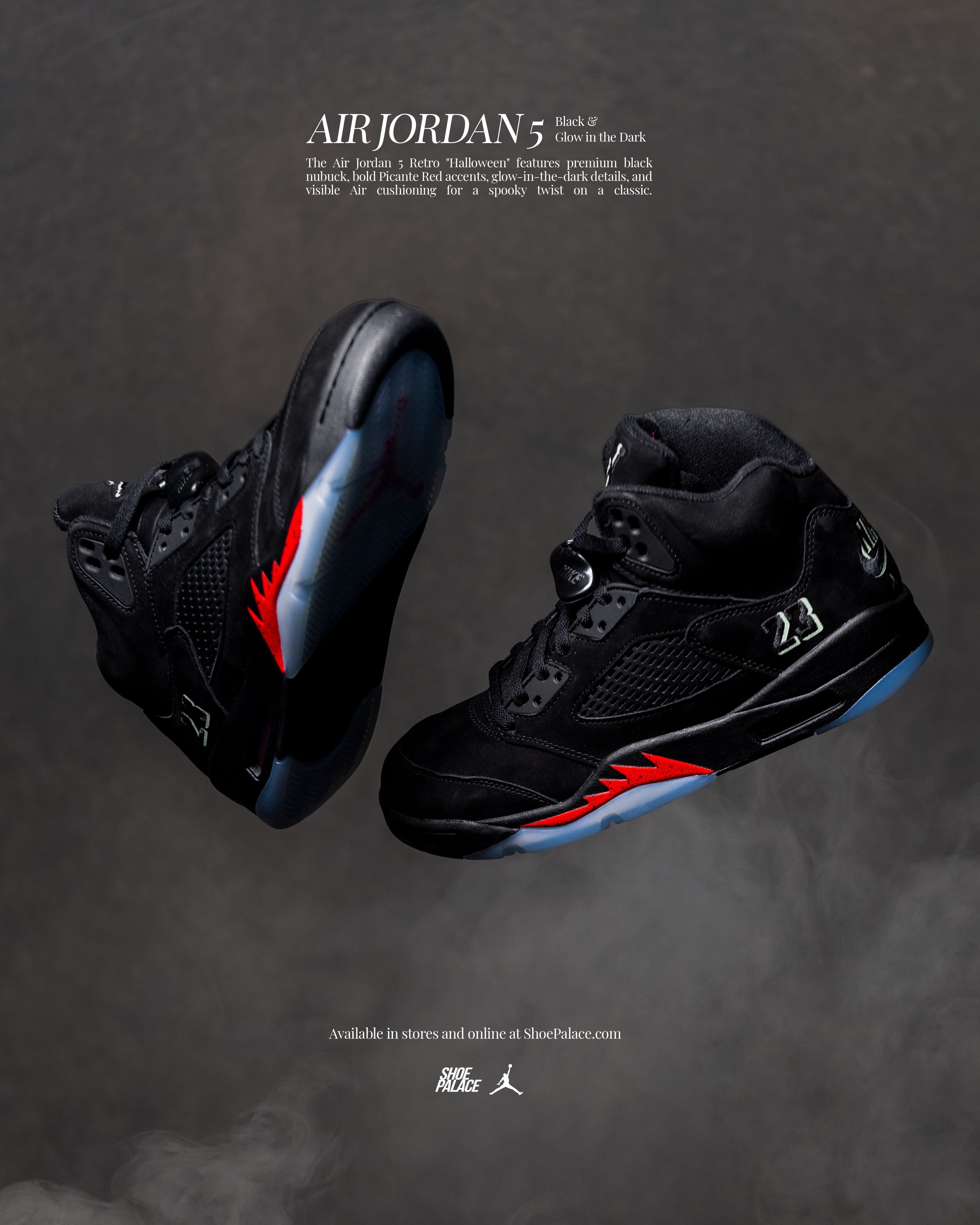 Air Jordan 5 sneakers in black with red and blue accents.