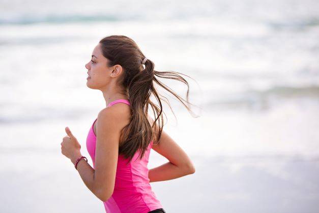 Woman In Pink Top Running