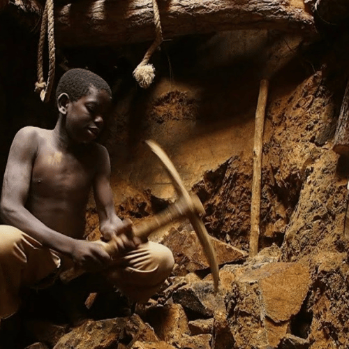A child working in a gold mine