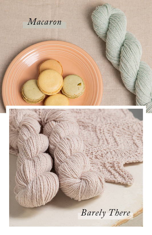 Top: Single skein of Dapple Macaron lying next to a plate of 5 assorted macarons. Bottom: Two skeins of Dapple Barely There sit on a weathered chair seat with a textured hand knit baby blanket in the same color.