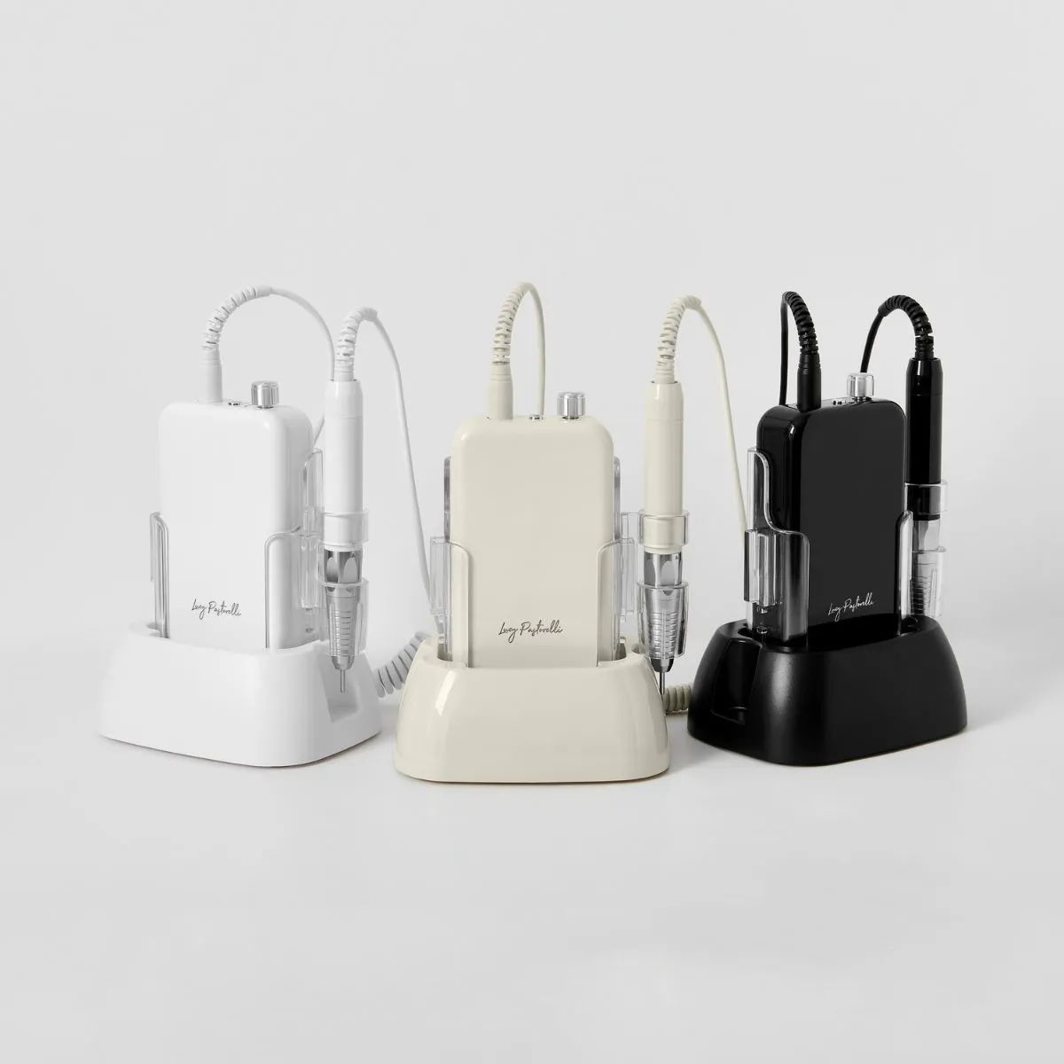 Three Lucy Pastorelli e-files in white, beige, and black colours.