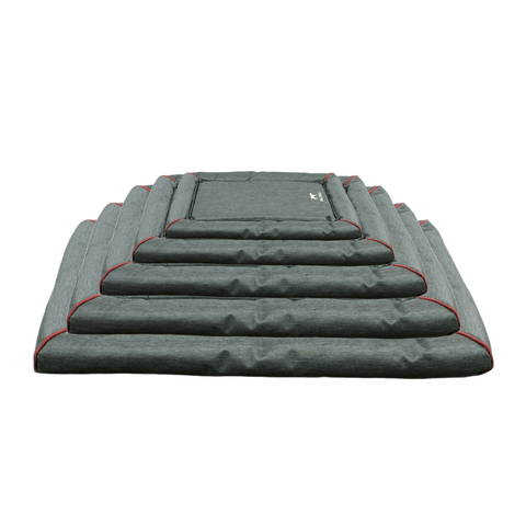 A stack of Grey bed crate mats 