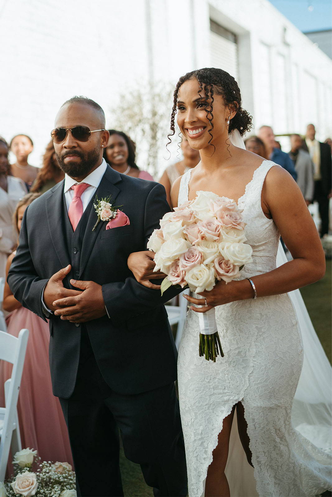 Bride and bride's father walking down aisle