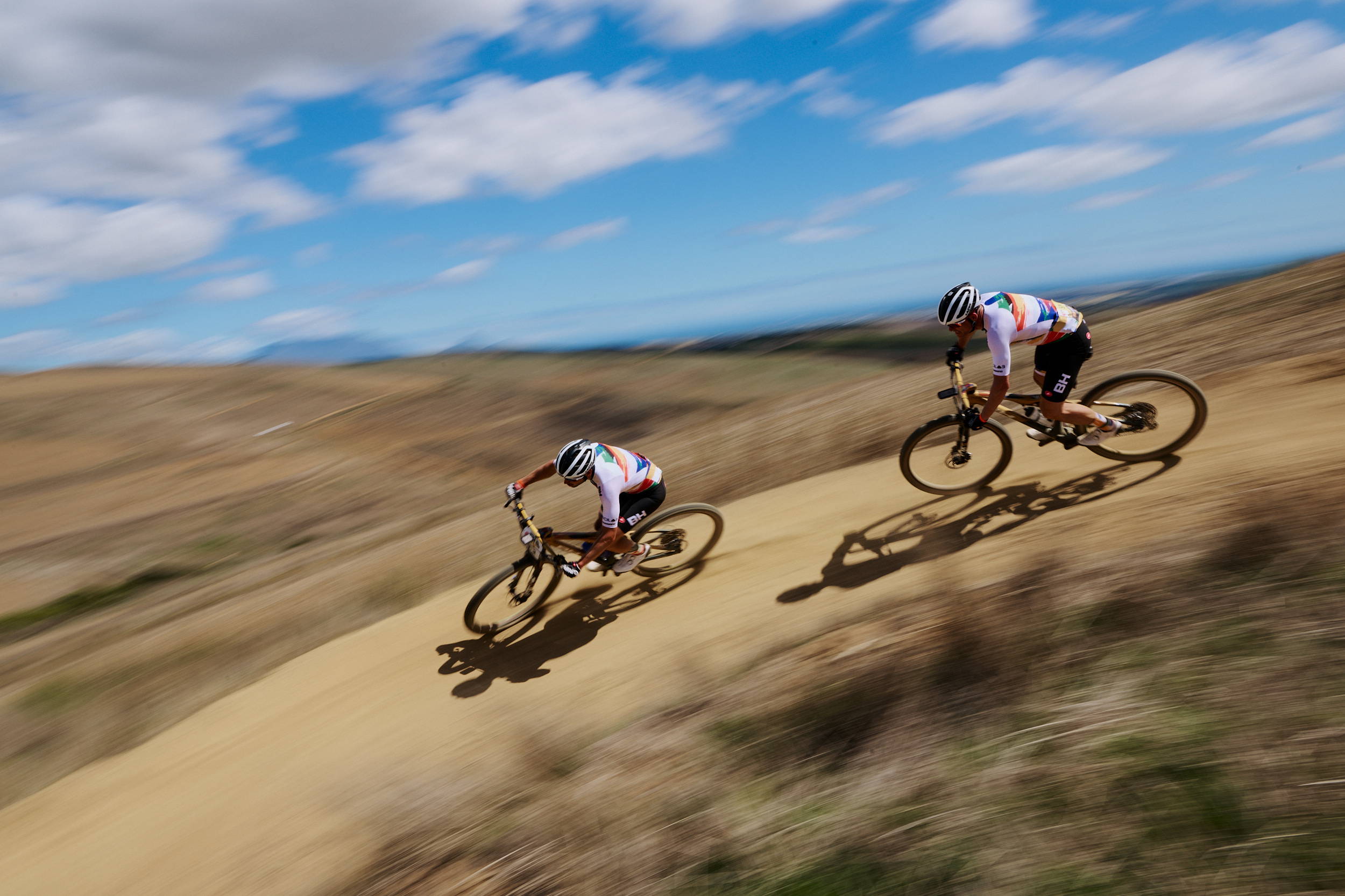 Niki and Gosse riding a trail