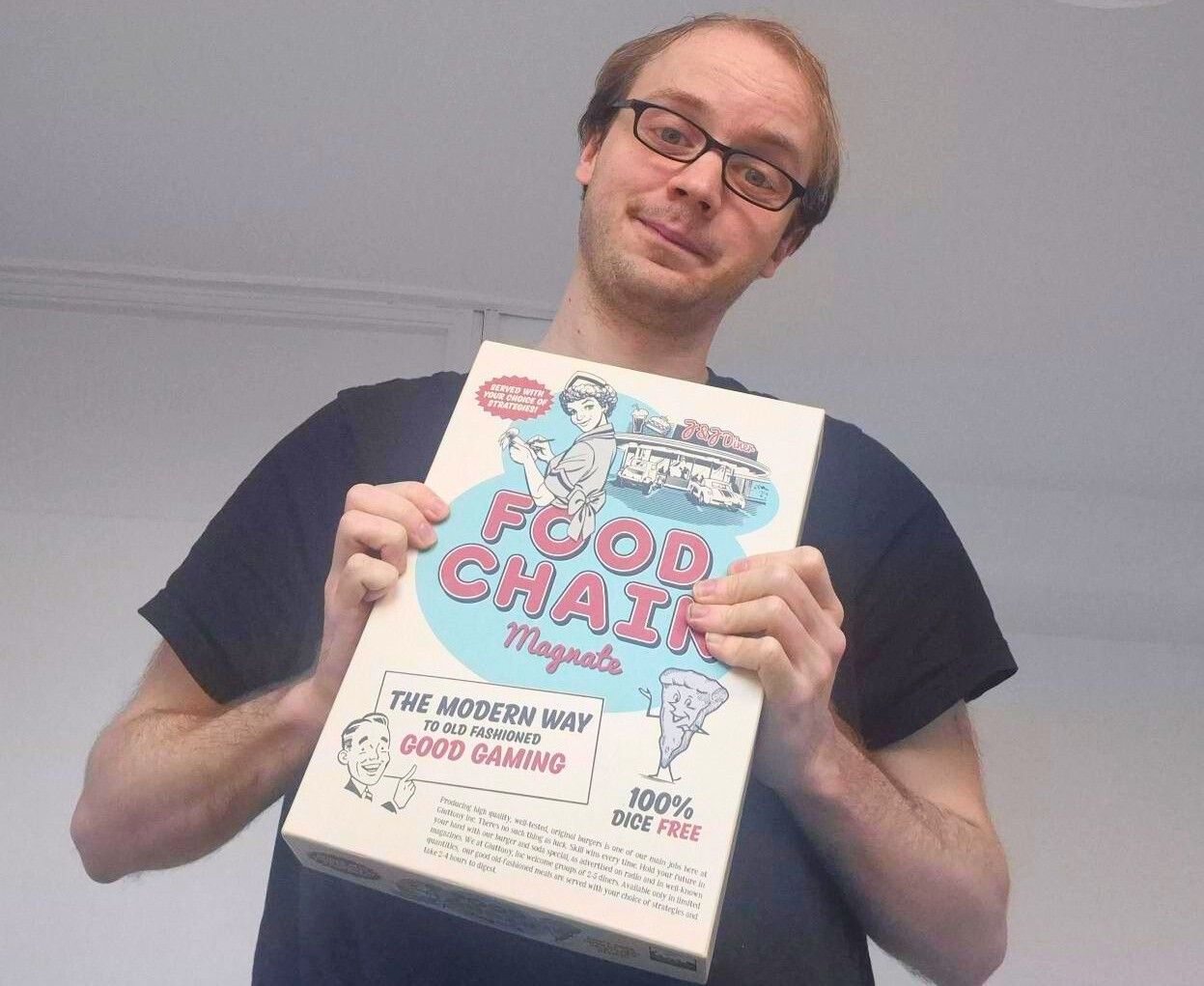 Person holding a poster for 