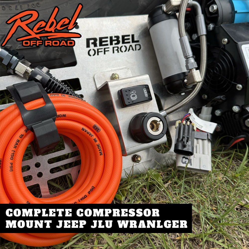 Complete compressor mount for Jeep JLU Wrangler with hoses and components.