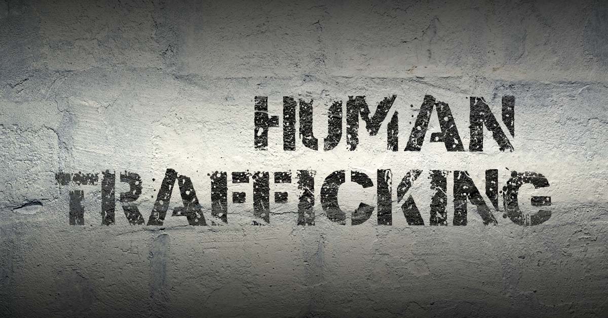 Human Trafficking writing on wall