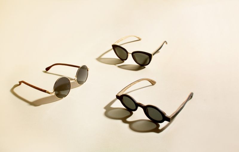 flat lay image of Kraywoods sunglasses collection for a triangle face shape on a solid background