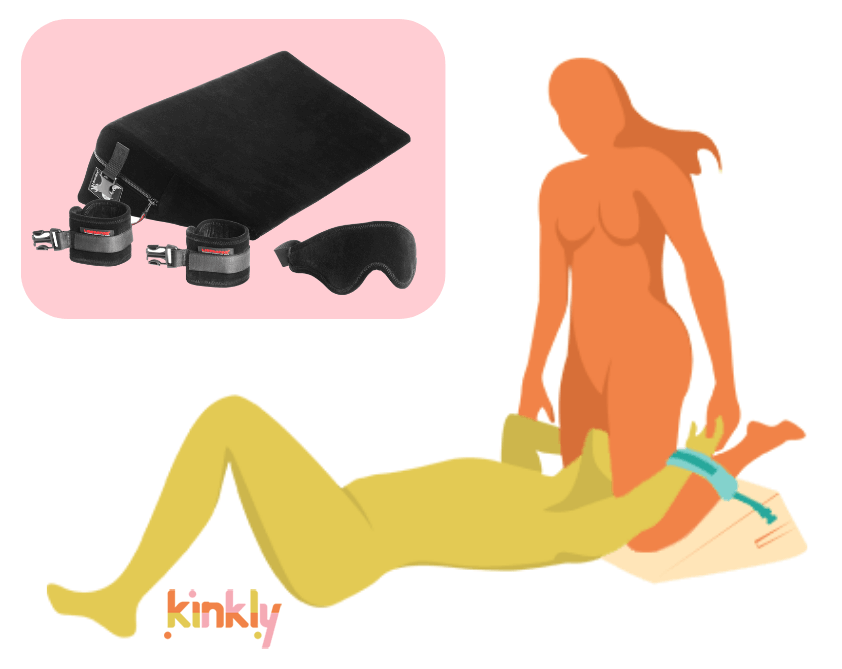 Liberator Black Label Wedge shown next to an illustrated Assisted Queen oral sex position. The giving partner is laying down with their head elevated on a Liberator Wedge and their wrists bound on the Wedge. The receiving partner is kneeling on top of the Wedge and giving partner's face. | Kinkly Shop