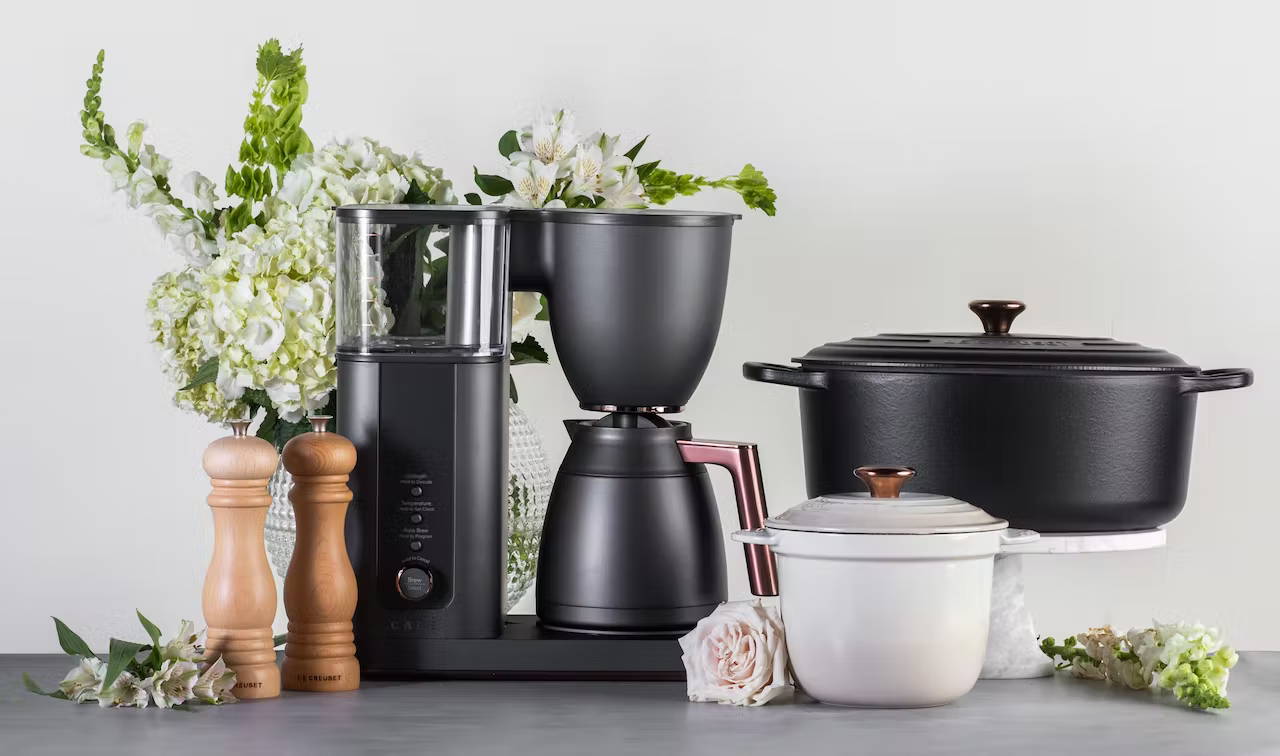 Display of Cafe coffee maker and Le Creuset products 