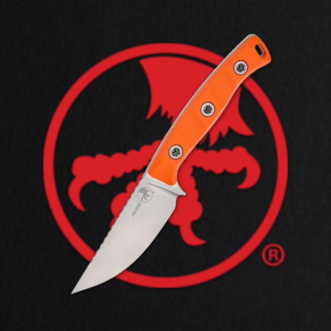 Knife with an orange handle on a black background featuring a red logo.