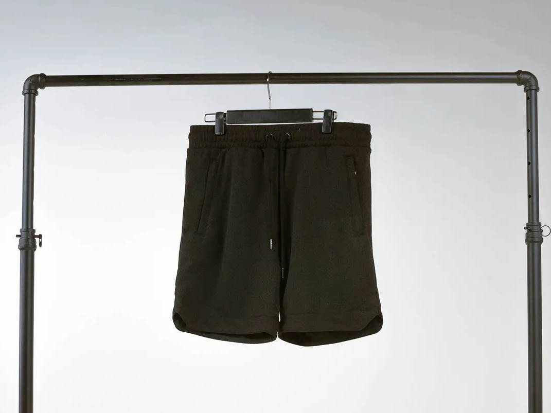 black maison article mesh shorts hanging