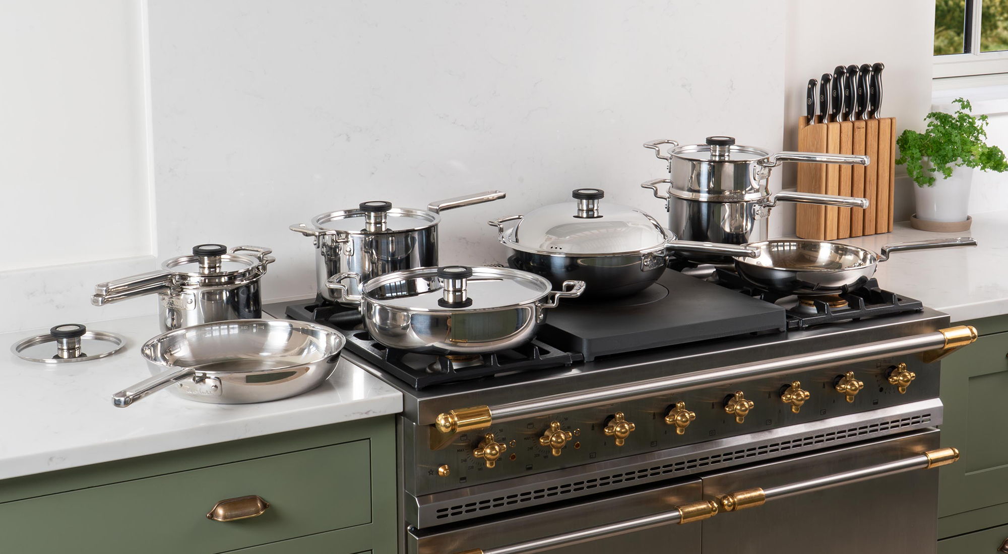 316 Series Cookware arranged on a modern kitchen stove.