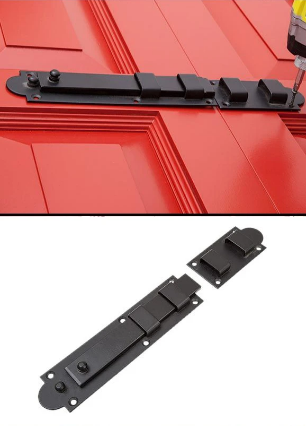 Black door latch on red door, with separate latch piece below.