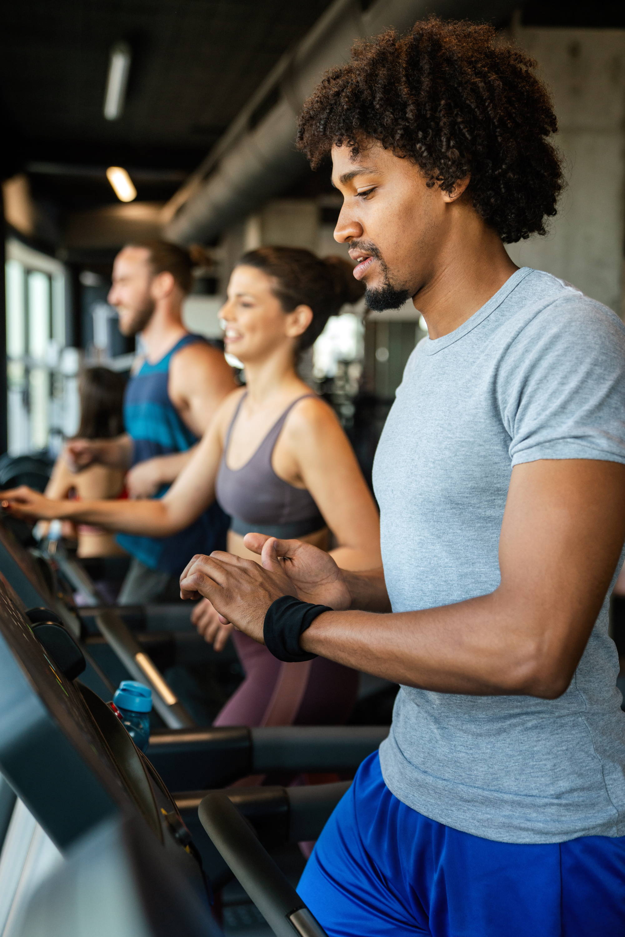 Workout recovery. Pre-workout. Man running on Treadmill