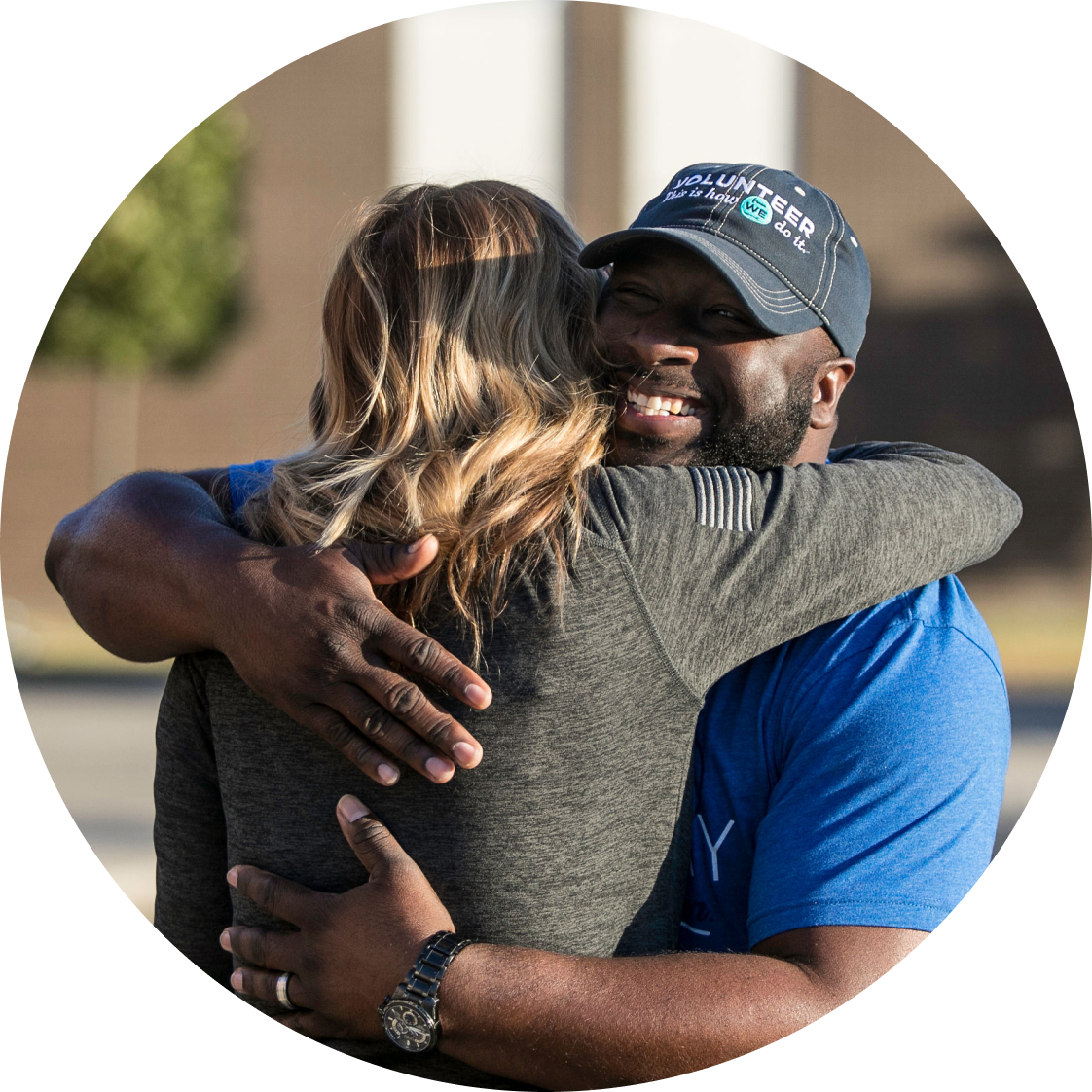 Man hugging woman