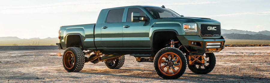 Rear truck bed spare tire delete well on Elite Customs 775's 2016 GMC 3500 Mega Cab Denali with HornBlasters Conductor's Special 244K kit layout, customer install gallery photo 1