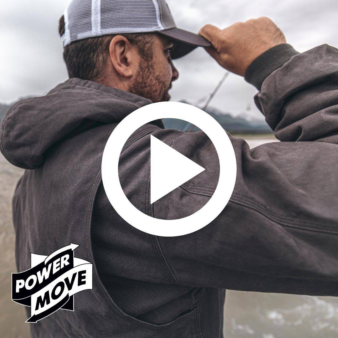 Man in DRI DUCK canvas jacket on the water