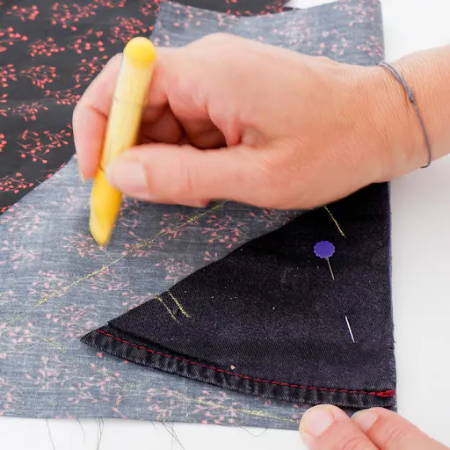 copying the pocket piece onto the new fabric with seam allowance