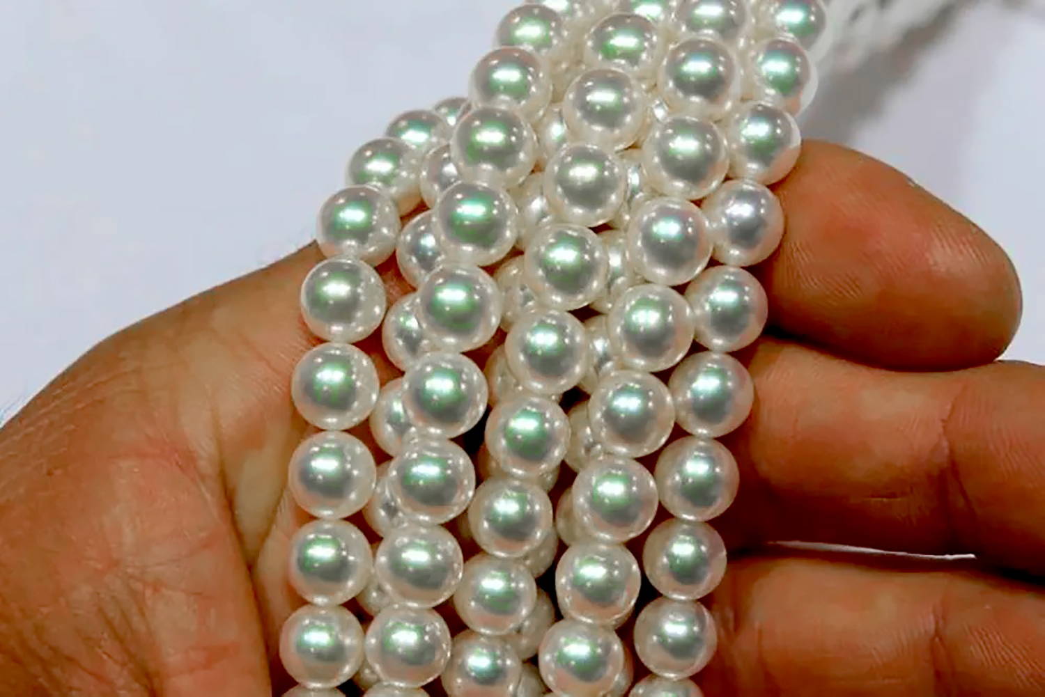 Handful of Hanadama Akoya Pearls